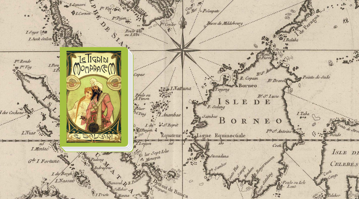 La copertina vintage del libro "Le tigri di Mompracem" di Emilio Salgari si trova sullo sfondo di una mappa ottocentesca del Borneo.